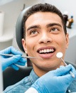 patient getting dental checkup