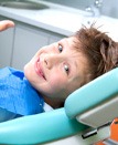 child smiling visiting dentist 