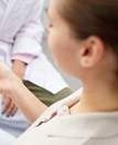 dentist explaining dental implants to patients